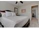 Comfortable bedroom with carpet, bed, and artwork on the walls at 23500 Bent Oaks Way, Parker, CO 80138