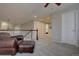 Upstairs living area with carpet and staircase, great for relaxation at 23500 Bent Oaks Way, Parker, CO 80138