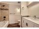 Updated bathroom with marble countertops, new tile, and modern fixtures at 7055 S Costilla St, Littleton, CO 80120