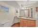 Bathroom with updated vanity and tile flooring at 6862 Independence Ct, Arvada, CO 80004