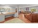 Bright living room with a large desk, perfect for a home office at 6862 Independence Ct, Arvada, CO 80004