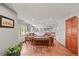 Cozy living room with built-in shelving and natural light at 6862 Independence Ct, Arvada, CO 80004