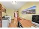 Multi-use room with office space and laundry hookups at 6862 Independence Ct, Arvada, CO 80004