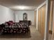 Basement bedroom with a queen-size bed and large closet at 21225 E Aberdeen Dr, Centennial, CO 80015