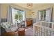 Bright Bedroom featuring natural light, hard wood floors and an accent wall at 1354 Tamarac St, Denver, CO 80220