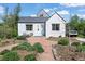 Charming single story home with a landscaped front yard and stone walkway at 1354 Tamarac St, Denver, CO 80220