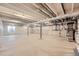 Unfinished basement with concrete flooring and insulated walls, providing ample space for future development at 400 Basin Daisy St, Castle Rock, CO 80104