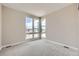 Empty bedroom with wall-to-wall windows offering natural light at 400 Basin Daisy St, Castle Rock, CO 80104