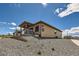 Charming home featuring a low-maintenance xeriscaped yard and covered patio at 400 Basin Daisy St, Castle Rock, CO 80104