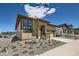 A warm single Gathering home featuring an attached two-car garage and beautiful xeriscape at 400 Basin Daisy St, Castle Rock, CO 80104