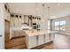 Gourmet kitchen with granite countertops, stainless steel appliances, and pendant lighting at 400 Basin Daisy St, Castle Rock, CO 80104