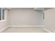 Spacious unfinished basement with neutral walls, carpet, and windows, awaiting your personal touch and design ideas at 7114 S Acoma Way, Littleton, CO 80120