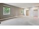Spacious bedroom with large windows and a closet with sliding doors at 8174 Dudley Cir, Arvada, CO 80005