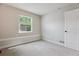 Neutral bedroom with a window and a carpeted floor at 8174 Dudley Cir, Arvada, CO 80005