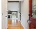 Bright foyer with hardwood floors, a high ceiling, and an open view to the living area at 8174 Dudley Cir, Arvada, CO 80005
