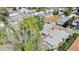 Aerial view of a home featuring a front yard, carport, and mature trees at 9021 Rampart St, Federal Heights, CO 80260