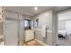 A functional bathroom equipped with a shower, vanity, and neutral-colored walls at 9021 Rampart St, Federal Heights, CO 80260