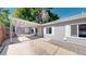 Attractive single-story home with a covered carport, shed, and neutral-colored exterior at 9021 Rampart St, Federal Heights, CO 80260