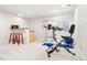 Basement featuring an exercise area, small bar, and a window for natural light at 134 S Pontiac St, Denver, CO 80230