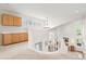 Bright loft area with built-in cabinetry and views of the living room below at 134 S Pontiac St, Denver, CO 80230