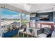 Outdoor kitchen with stainless steel appliances and a view of the neighborhood at 10252 E 58Th Ave, Denver, CO 80238