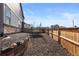 Backyard with gravel area and trampoline at 944 Black Saddle St, Elizabeth, CO 80107