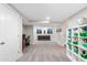 Finished basement with game area, office space, and shelving at 944 Black Saddle St, Elizabeth, CO 80107