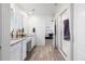 Main bathroom with granite countertop, double sinks, and shower at 944 Black Saddle St, Elizabeth, CO 80107