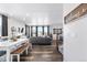 Bright dining area with a farmhouse-style table and bench seating at 944 Black Saddle St, Elizabeth, CO 80107