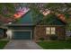 Beautiful two-story home featuring a stone facade, attached two car garage and charming curb appeal at 11862 W Stanford Pl, Morrison, CO 80465