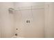 Utility laundry room with easy hookups and storage shelf, ready to customize for convenience at 11862 W Stanford Pl, Morrison, CO 80465