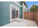 Patio with sliding door and wood privacy fence at 11862 W Stanford Pl, Morrison, CO 80465