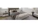 Cozy bedroom featuring a large bed with neutral colored linens and a patterned throw at 314 Galapago St, Denver, CO 80223