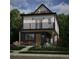 Modern two-story home with eye-catching balconies, wood accents, manicured landscaping, and vibrant seating area at 314 Galapago St, Denver, CO 80223