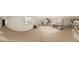 Open-concept living and dining area with hardwood floors and a modern staircase at 314 Galapago St, Denver, CO 80223