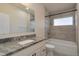 Bathroom featuring tub and shower, granite counter tops, and neutral decor at 875 E 78Th Ave # 72, Denver, CO 80229