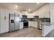 Updated kitchen with stainless steel appliances, granite counters and stylish cabinetry at 875 E 78Th Ave # 72, Denver, CO 80229