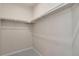 Walk-in closet with carpeted floor and shelf with hanging bar at 875 E 78Th Ave # 72, Denver, CO 80229
