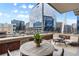 Comfortable outdoor seating on a spacious balcony, showcasing a prime view of the cityscape and architectural design at 2100 16Th St # 600, Denver, CO 80202