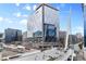 An eye-level exterior view showcases the neighborhood's architectural features and pedestrian walkways at 2100 16Th St # 600, Denver, CO 80202
