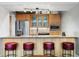 Charming kitchen featuring stainless steel appliances, wood cabinetry, and granite countertops at 2100 16Th St # 600, Denver, CO 80202