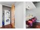 Laundry room and kitchen featuring wood cabinetry, stainless steel appliances, and granite countertops at 2100 16Th St # 600, Denver, CO 80202