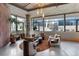 Bright and airy living room with large windows offering city views and stylish modern furniture at 2100 16Th St # 600, Denver, CO 80202