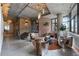 Open-concept living space with unique furnishings, exposed brick accents, and ample natural light at 2100 16Th St # 600, Denver, CO 80202