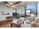 The living space is well lit, features large windows, and a concrete ceiling at 2100 16Th St # 600, Denver, CO 80202