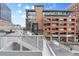 A ground-level captures neighborhood architecture, street life, and nearby shops, providing an immersive urban experience at 2100 16Th St # 600, Denver, CO 80202