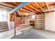 Unfinished basement area with stairs and open floor plan to design your dream space at 1698 S Kingston St, Aurora, CO 80012