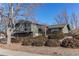 Charming two-story home with brick accents, mature landscaping, and a well-manicured front yard at 1698 S Kingston St, Aurora, CO 80012