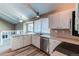 Beautiful kitchen with bright lighting, stainless steel appliances, and plentiful natural light at 1698 S Kingston St, Aurora, CO 80012