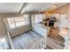 Kitchen with modern appliances, bright lighting, eat-in area, and a large window at 1698 S Kingston St, Aurora, CO 80012